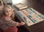 Maeve with her puzzles